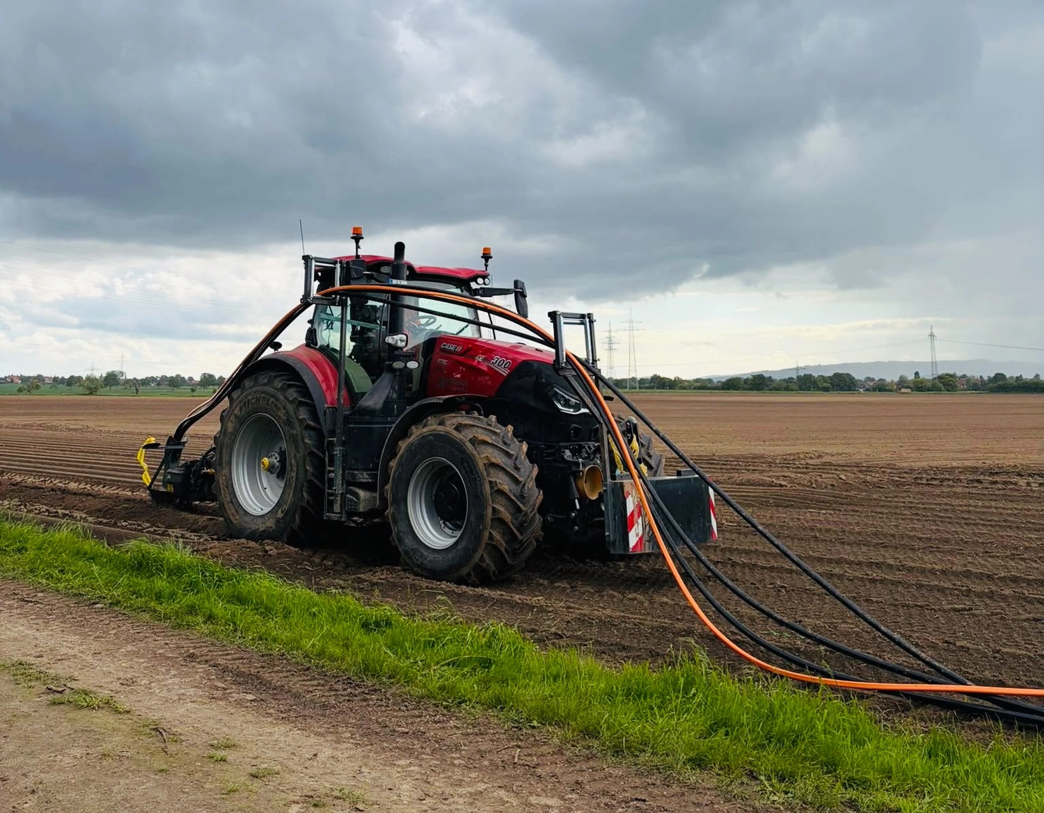 Bioenergie Fischerhöfe - Kabelpflug - Kabelziehen mit Traktor